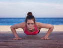 fit heathy woman doing push up or press up